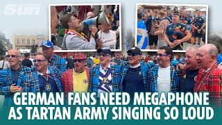 German fans need a megaphone as they are drowned out by Tartan Army singing [upl. by Stace]