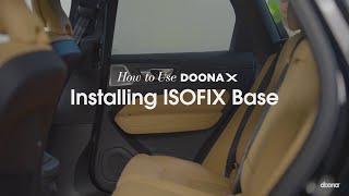 How to install the ISOFIX base  Doona X Car Seat amp Stroller [upl. by Elatan260]