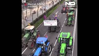 Farmers drive tractors through Madrid in protest against EU policies [upl. by Rexana]