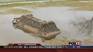 Manitowoc grave erupts due to flooding [upl. by Edialeda]