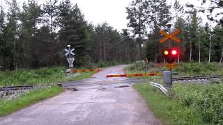 Intercity Ic 9 passed RATILA Km 04110381 level crossing in Parikkala Finland [upl. by Oidgime]