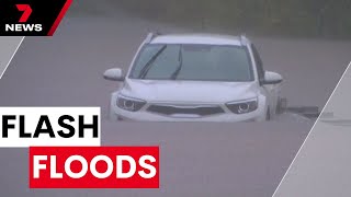 Heavy rain causes flash floods across Brisbane and the Redlands  7NEWS [upl. by Nazus]