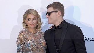 Paris Hilton and Chris Zylka at the 25th annual amfAR Gala in Cannes [upl. by Kessiah]