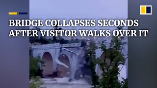 Bridge in China collapses seconds after visitor walks over it [upl. by Russ]