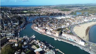 BRITISH AERIAL VIEWS  WEYMOUTH HARBOUR AND SEAFRONT DORSET UK [upl. by Elleynad59]