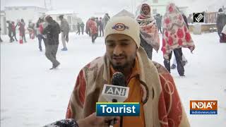 Watch Tourists enjoy snowfall in Kedarnath [upl. by Connor498]