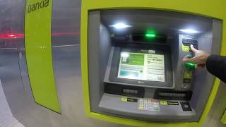 OBSOLETO Pago del SEGURO ESCOLAR en el cajero de Bankia Avda Juan Carlos I [upl. by Decrem890]