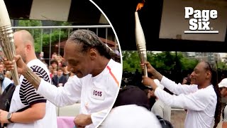 Watch Snoop Dogg carry Olympic torch on final leg of journey to Paris Olympics [upl. by Anelad997]