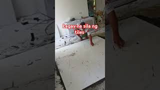 House construction in the philippines tiles fixing in the hall [upl. by Cacia]