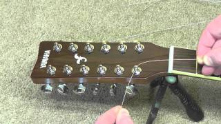 How to Restring a 12String Guitar and fix a cracked bridge [upl. by Sillyrama701]