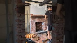 Chimney breast construction in Sunningdale with wood stove installation and reclaimed brick slips [upl. by Meekyh]