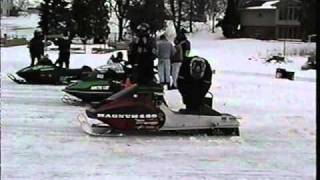 Racing vintage snowmobiles on the ice [upl. by Goodard]