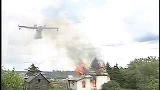 Canadair drop over house on fire [upl. by Beshore]