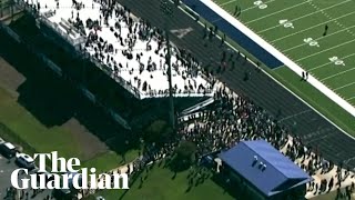 Aerial video shows evacuated students in football field after school shooting in Georgia [upl. by Lertnek]