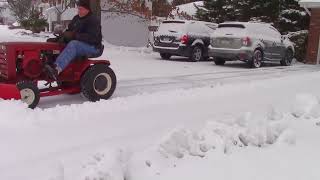 Plowing snow with a 1974 Wheel Horse C120 Automatic [upl. by Moazami834]