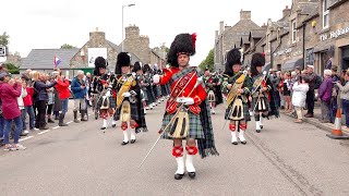 Drum Major Ian Esson leads the massed pipes and drums through Tomintoul to the 2019 Highland Games [upl. by Borek]