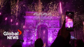 New Years 2023 Paris France gets the party started with fireworks smoke show over Arc de Triomphe [upl. by Kered]