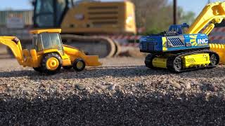 Construction toys  Hot wheels Matchbox and NORSCOT CAT 966G Wheel Loader at construction site￼ [upl. by Eelik444]