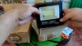 Unboxing generic 80 watts solar LED flood lights [upl. by Nashom277]