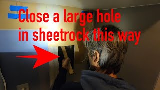 How to close a large hole in sheetrock [upl. by Pandora]