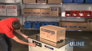 Uline H2079 SemiAutomatic Poly Strapping Machine  Demonstration [upl. by Balfore]