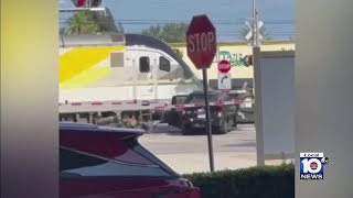 Brightline train destroys SUV after family gets out in MiamiDade [upl. by Licna]