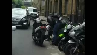 Thiefs try steal motor bike in London and get tackled [upl. by Ordnassela190]