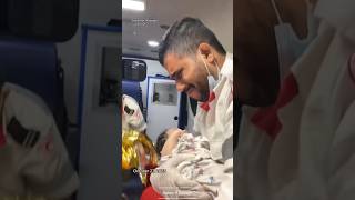 Gaza emergency worker breaks down in tears while cradling baby shorts [upl. by Apul266]