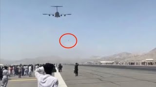 Afghans Cling To C17 Fall To Their Death On Takeoff [upl. by Ardnoet]