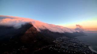 Timelapse of clouds streaming over the The Twelve Apostles Table Mountain National park [upl. by Aikcir]