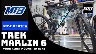 Trek Marlin 6 Review and Buying Your First Mountain Bike [upl. by Nogas]