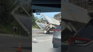 Semi truck trailer stuck sideways underneath a Chicago bridge [upl. by Etan]