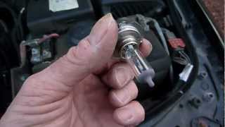 How to change a Renault Laguna headlamp bulb [upl. by Sabas]