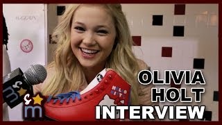 Olivia Holt Talks quotI Didnt Do Itquot amp Shows Off Roller Skates [upl. by Siravrat]