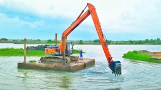 Excavator on pontoon crossing river TATA HITACHI EX215 Super long reach [upl. by Llertniuq]