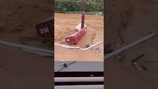 New video from NC shows powerful flood water tearing building in half [upl. by Pedaiah423]