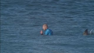 Surfer Fights Off Shark During Competition [upl. by Compte632]