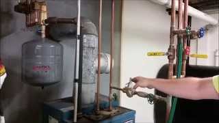 How To Remove Air From Your Heating System [upl. by Atteynek]