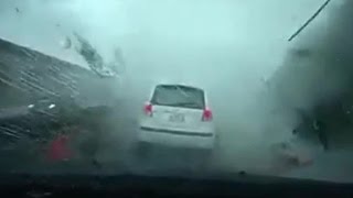 Car blown away by Taiwan typhoon caught on video [upl. by Ttelrahc]