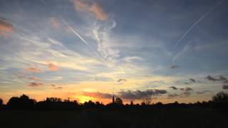 Sunset on Oude Klapwijkseweg in Pijnacker  zonondersgang met kerk in achtergrond [upl. by Tierza]