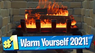 Warm yourself at the Yule Log in the Cozy Lodge  Fortnite Winterfest 2021 Challenge [upl. by Adao]