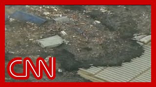 Watch a massive tsunami engulf entire towns in Japan 2011 [upl. by Auhsot645]